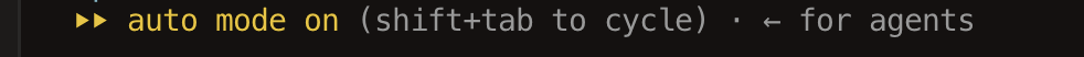 A status line in a terminal reading auto mode on, shift plus tab to cycle, with the words auto mode on in yellow